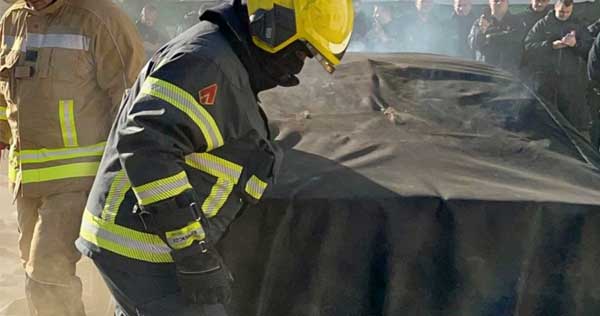 Training blanket which is training equipment to practice using a fire blanket.